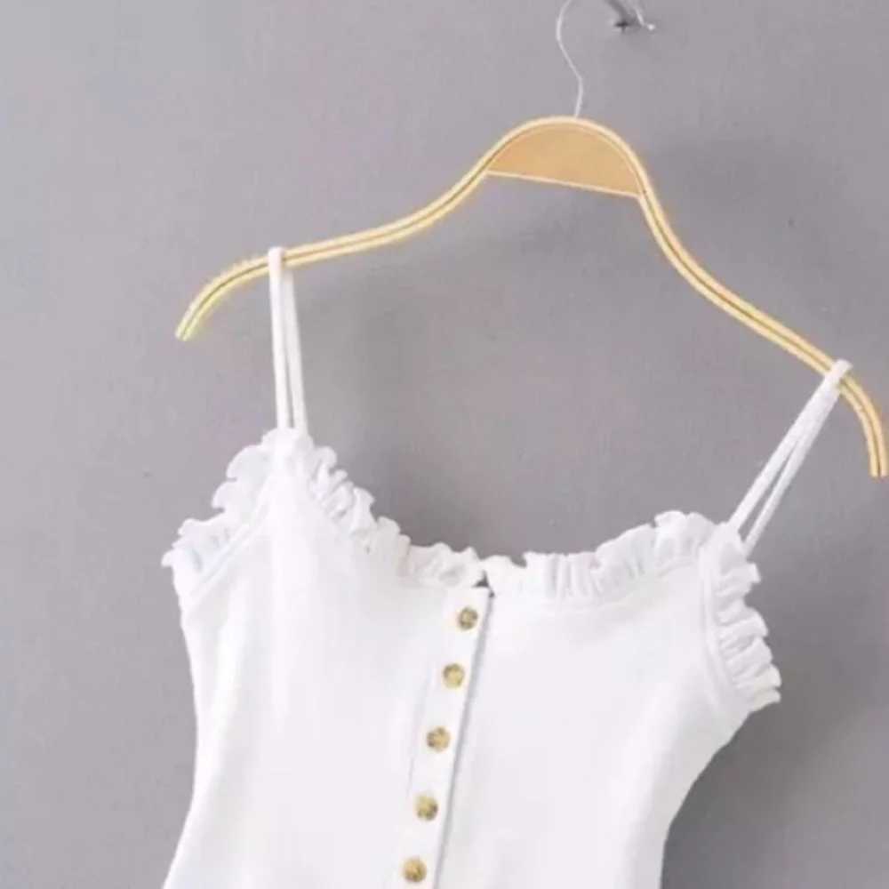 SOLD OUT The Cutest White Ribbed Button Ruffled Bodysuit - Picture 5 of 6